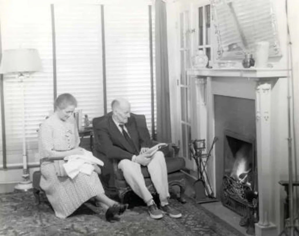 Paul and Jean Harris by the Fireplace Paul and Jean Harris seated together beside the fireplace at Comely Bank.